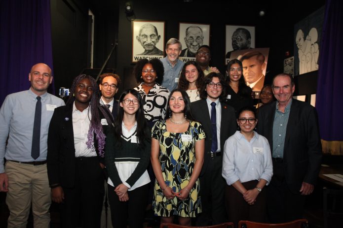 IPS's 2024 Henry A. Wallace Fellows pose with Scott Wallace (far right). (Photo: Rick Reinhard)